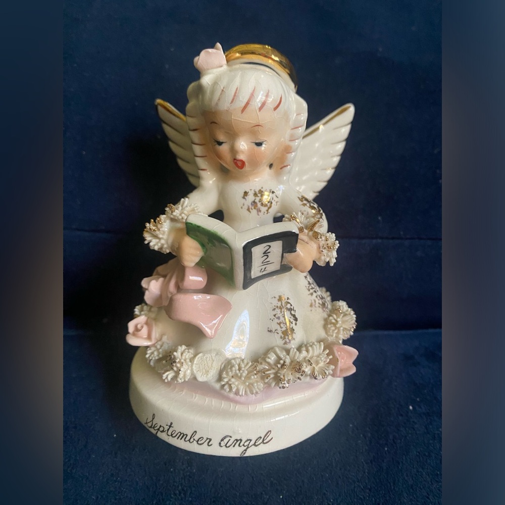 Vintage 1950’s Napco September Angel Holding Math Book.